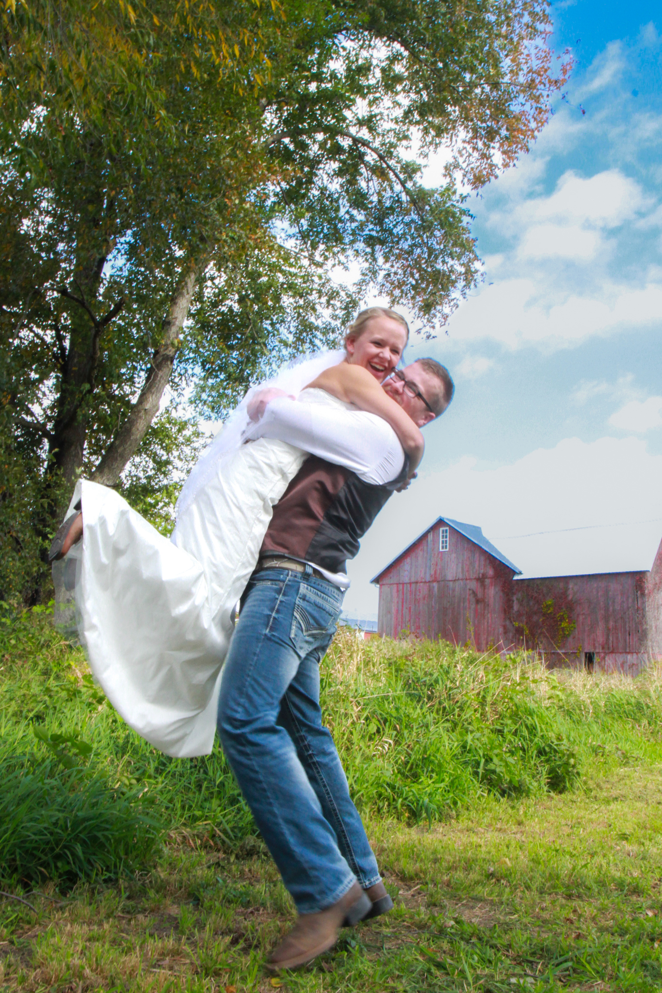 Groom picks up bride