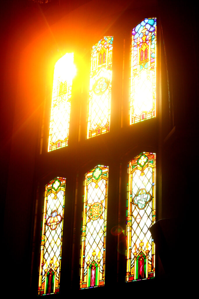 Sunset coming through stain-glass windows in a church in Pasadena, California