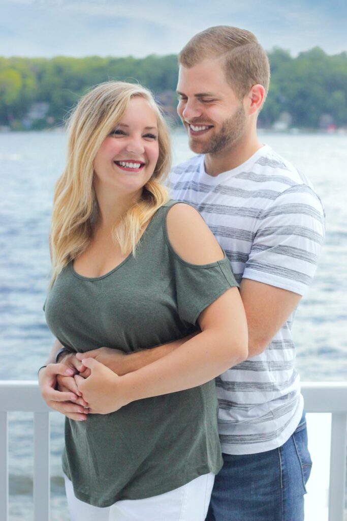 Family photographs, young couple holding each other smiling